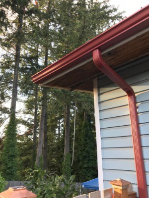 5k red gutters and 2x3 downspouts - Amigo Gutters