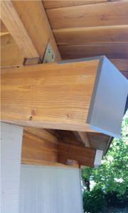Metal flashing on exposed beam installed by Amigo Gutters