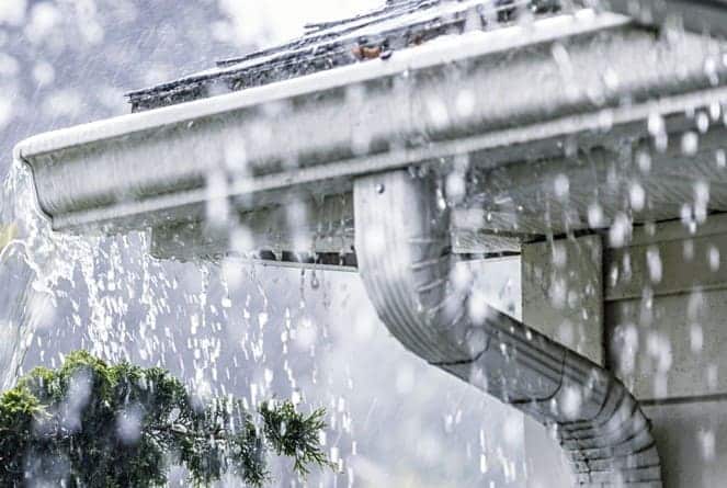 Overflowing gutters by https://www.erieinsurance.com/blog/clean-gutters